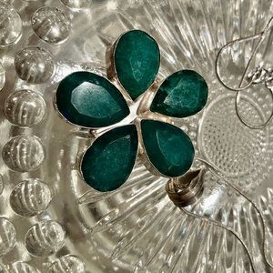 Sterling Silver pendant set with emerald composite.